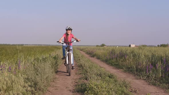 Bicycling in the meadow. 