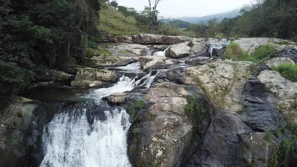 Flying over the beautiful countryside nature of rivers, waterfalls and trees of Brazil. A very roman