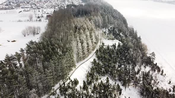 Aerial drone view of hillside pathway in Kadagiu Slenis, Lithuania