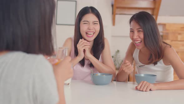 Asian women have breakfast at home.