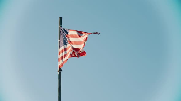 Flag of USA Blowing in the Wind on the Background of Clear Sky