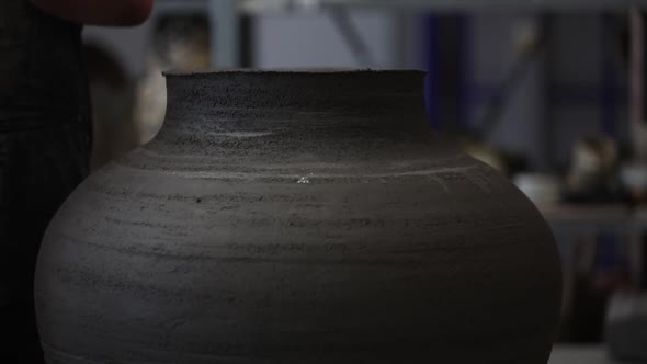 video of how a person creates a pot of clay according to ancient technology