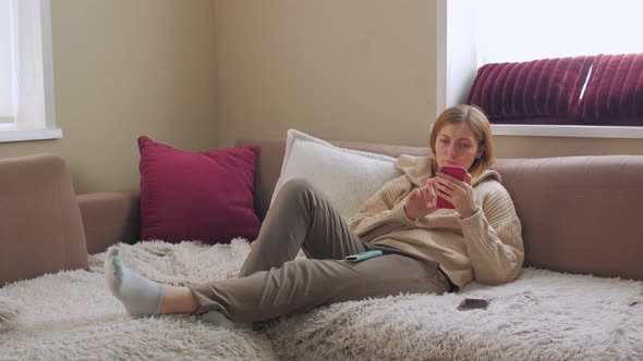 Woman On Sofa Resting