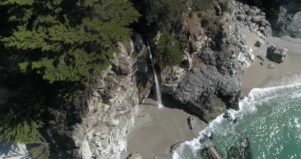 Aerial Slow Motion view of Water Fall McWay Falls Julia Pfeiffer Burns Park Big Sur California