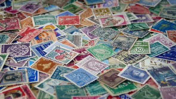 Many Old Stamps Rotating Slowly