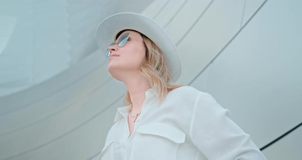 Cool Portrait of Beautiful Young Woman on Modern City Streets in Slow Motion, 