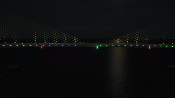 Video of the Sunshine Skayway Bridge in Florida at night while a cargo ship passes under the bridge