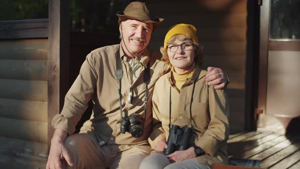 Portrait of Senior Couple on Terrace of Forest House