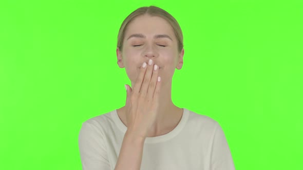 Young Woman Wishing for Good luck on White Background