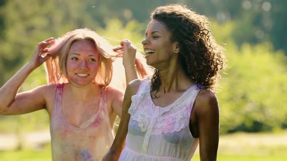 Excited Females Laughing After Being Splashed With Cold Water at Party Slow-Mo