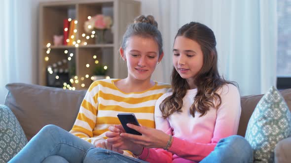 Teenage Girls with Smartphone Having Video Chat