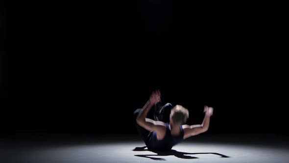 Young Blonde Dancer Man Starts Dancing Breakdance on Black