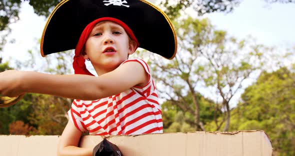 Boy pretending to be a pirate alt