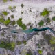 Flight Over a Mountain River and a Trail to a Gorge Among a Coniferous Forest - VideoHive Item for Sale
