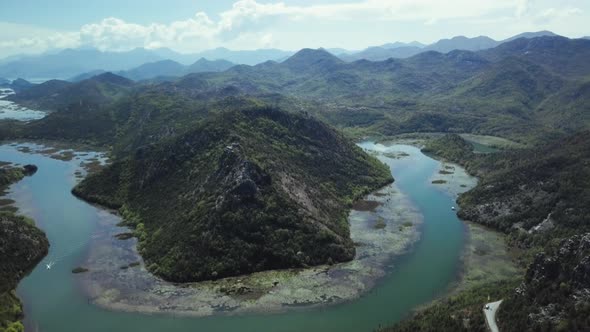 Aerial footage Beautiful Nature Montenegro.  Flying over the calm Lake Shkoder