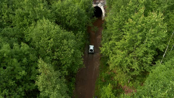 Aerial View of the Car Entering the Tunnel