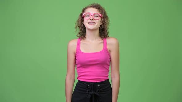 Young Happy Beautiful Nerd Woman Smiling with Eyeglasses