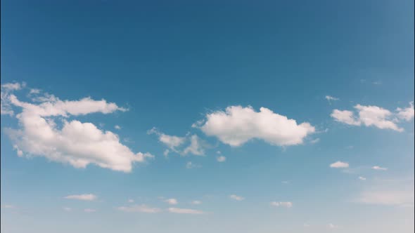 Clouds timelapse on a blue sky