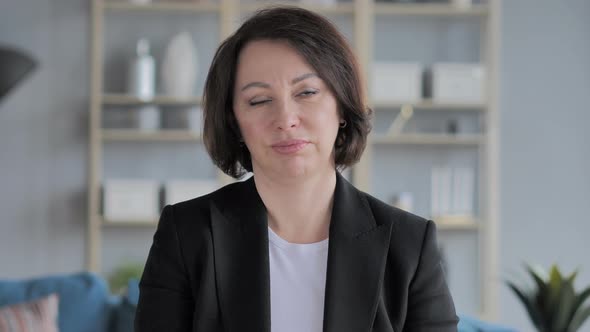 Portrait of Old Businesswoman Shaking Head To Reject,  Deny