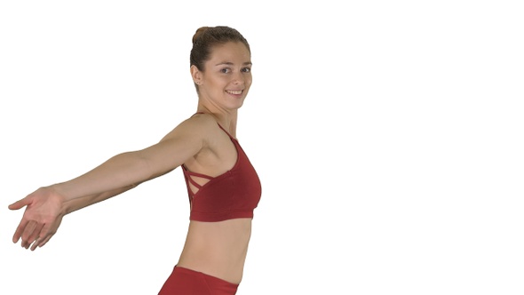 Sportive fitness sportswoman stretching arms and laughing