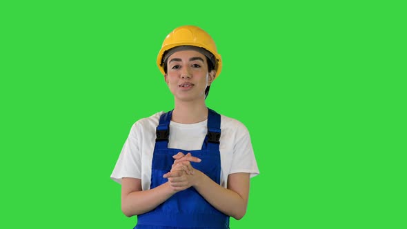 Construction Woman in Hardhat Talking Looking at Camera on a Green Screen Chroma Key alt