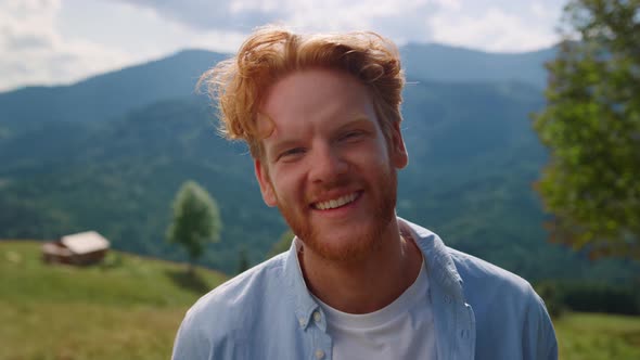 Portrait Happy Man Smiling on Green Meadow