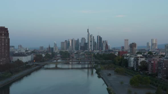 Empty Frankfurt Am Main Skyline in Early Morning Light Reflecting in Skyscrapers with Main River and