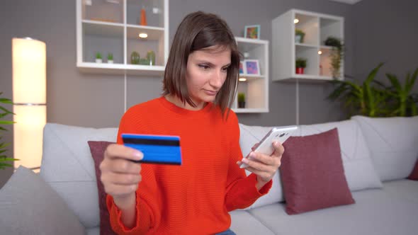 Woman is shopping with a credit card