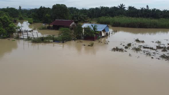 Aerial fly over Malays wooden house at countryside