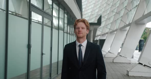 Attractive Red Haired Man in Business Suit Go to Office Outdoors