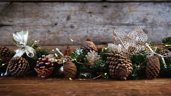 Christmas decorations on wooden plank