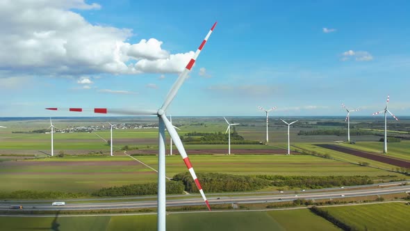 Aerial View of Wind Turbines Farm in Field. Austria. Drone View on Energy Production