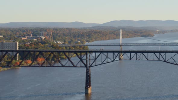 Aerial of walkway and Mid-Hudson Bridge over Hudson river