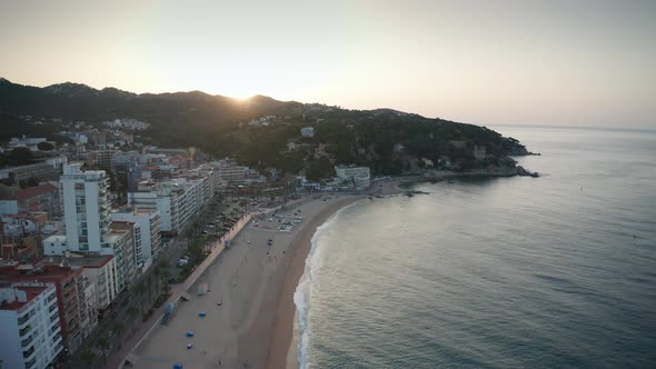 Drone View of Empty Lloret De Mar Beach at Sunrise