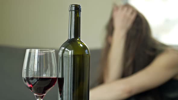 Closeup of a Bottle of Wine and a Glass