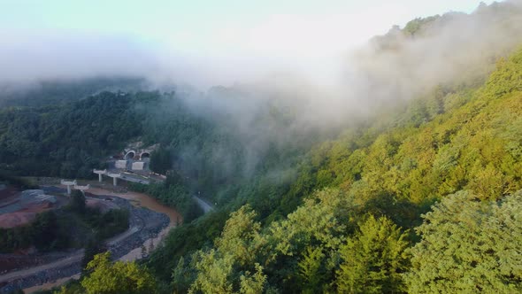 Highway And Tunnel Construction In The Foggy Mountains