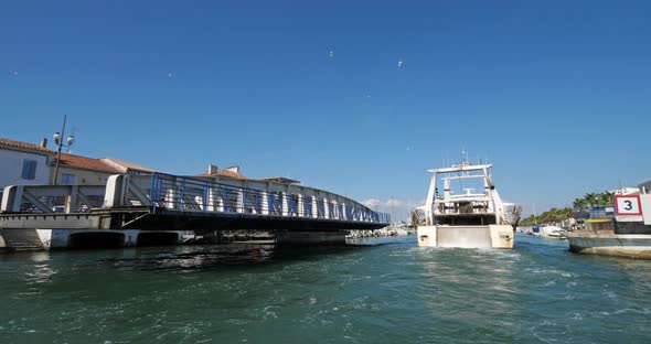 Le Grau du Roi, Gard, France. Fishing boats coming back to the harbour.