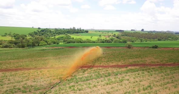 Jets of vinhoto being thrown into the sugar cane plantation to fertilize the plant contain many nutr