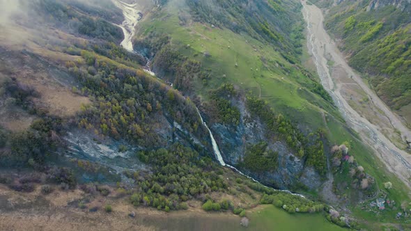 Closeup Aerial View of the Mountain Slope and a Valley