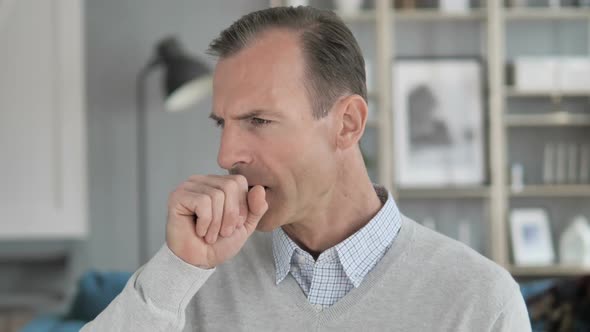 Cough Portrait of Sick Middle Aged Man Coughing at Work