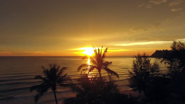 Aerial view of scenic sunset reflection over the water, Ko Chang, Thailand.