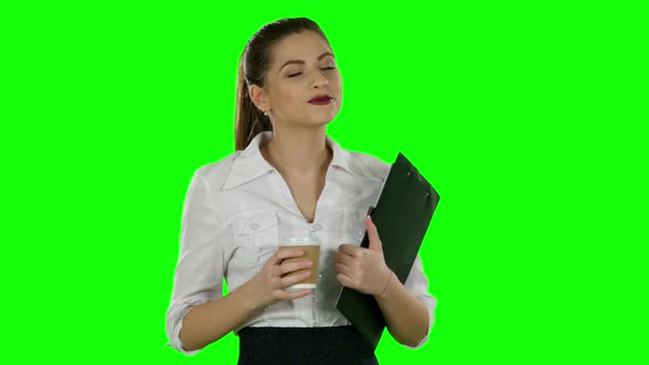 Business Woman Drink Coffee with Folder in Hands, Green Screen