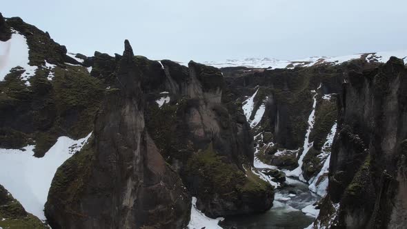 Aerial view of Fjardarargljufur canyon with river in wintertime, Iceland.