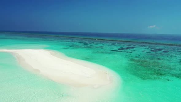 Aerial view seascape of paradise shore beach vacation by clear ocean and bright sandy background of 