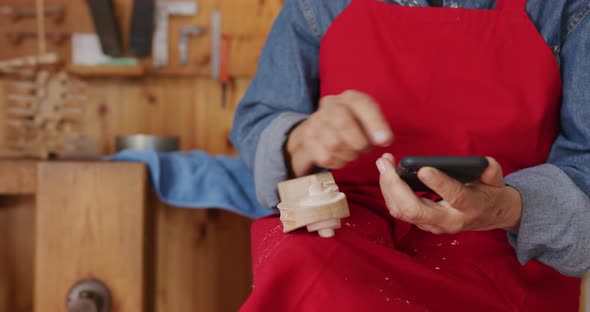 Female luthier at work in her workshop