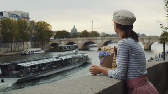 Attractive girl with a flower, Paris