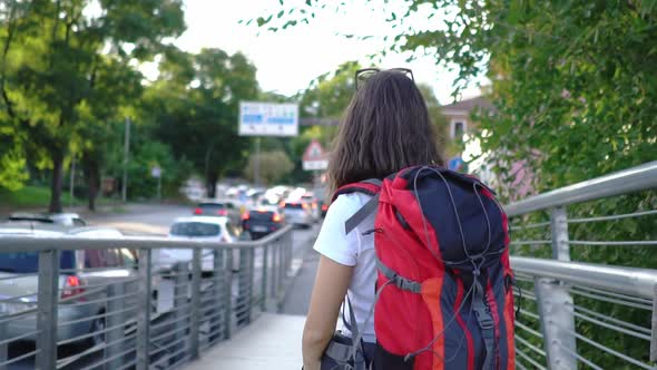 Female tourist with backpack