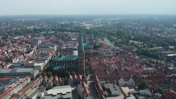 Aerial Panoramic Footage of Old Town Lined with River