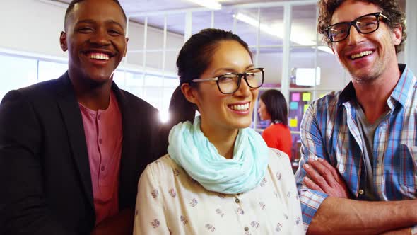 Portrait of business executives smiling at camera