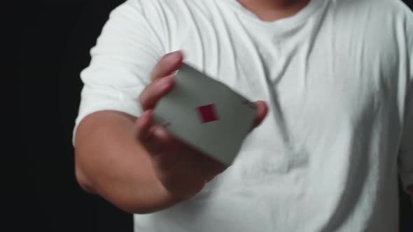 Magician Showing His Trick With Usual Cards, Magician Changes Card